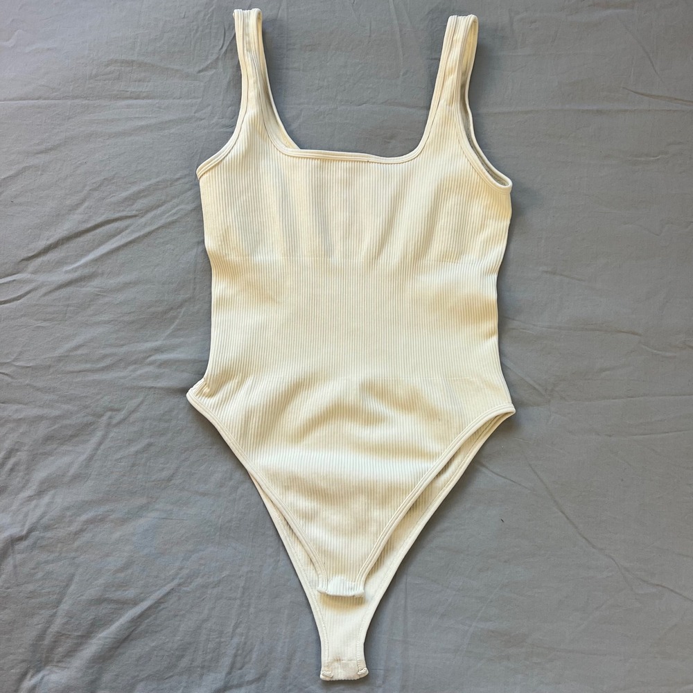 OQQ Sleeveless Thong Bodysuit Women's Size Medium Cream Ribbed Square Neck Nylon